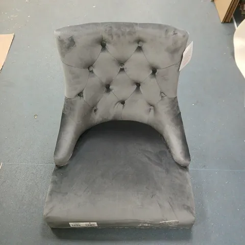 Grey tufted accent chair
