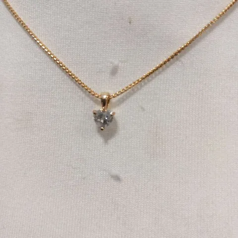 18CT YELLOW GOLD PENDANT ON CHAIN, SET WITH A NATURAL HEART SHAPED DIAMOND