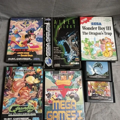 APPROXIMATELY 7 ASSORTED SEGA RETRO VIDEO GAMES TO INCLUDE MEGA GAMES I, WORLD OF ILLUSION, ECHO THE DOLPHIN ETC 