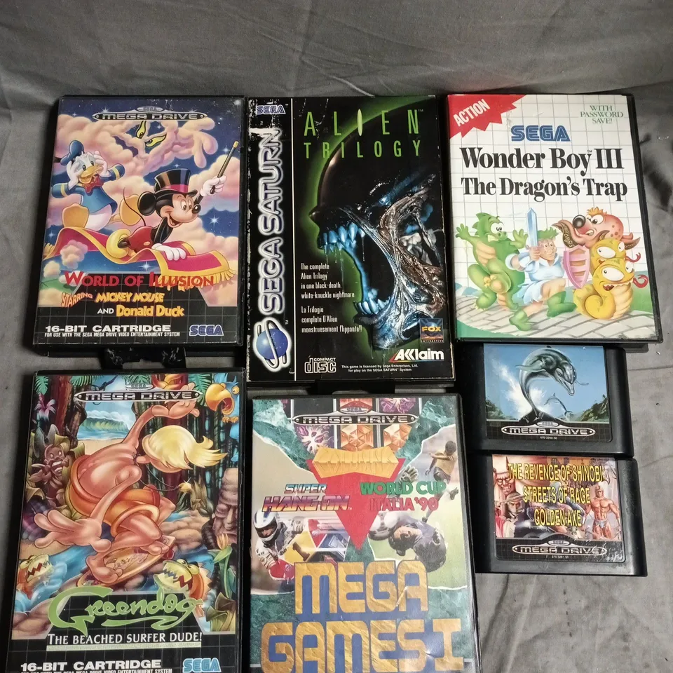 APPROXIMATELY 7 ASSORTED SEGA RETRO VIDEO GAMES TO INCLUDE MEGA GAMES I, WORLD OF ILLUSION, ECHO THE DOLPHIN ETC 