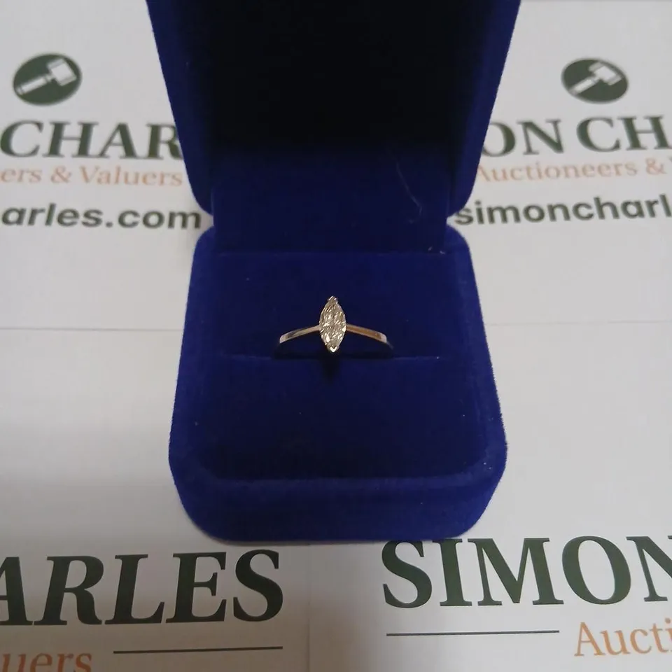 18CT WHITE GOLD SOLITAIRE RING SET WITH A MARQUISE CUT NATURAL DIAMOND