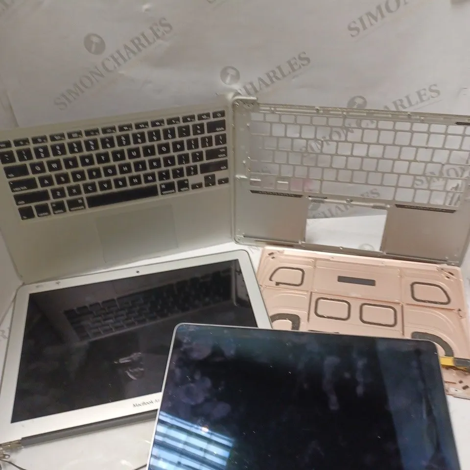 APPROXIMATELY 30 ASSORTED MAC BOOK SPARE PARTS TO INCLUDE KEYBOARDS, SCREENS, OUTER CASINGS ETC 