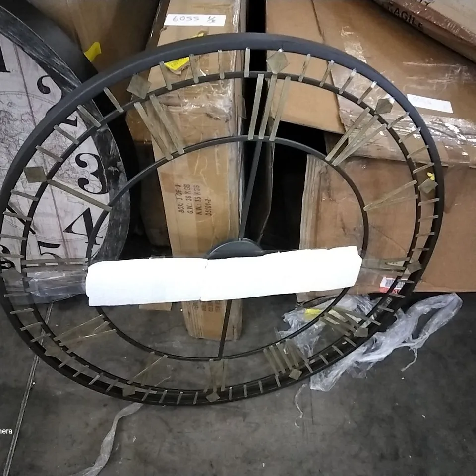 DESIGNER BLACK FRAME ROMAN NUMERAL ROUND WALL CLOCK