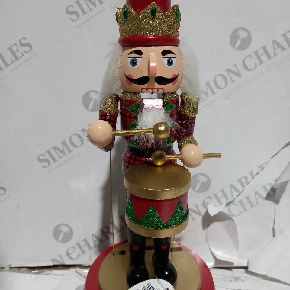 BOXED FESTIVE 32CM WOODEN ANIMATED MUSICAL NUTCRACKER