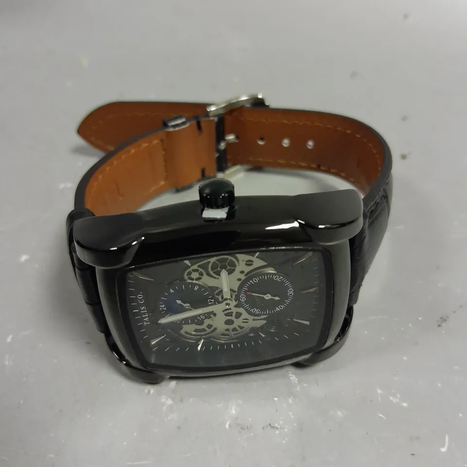 TALIS CO SKELETON DIAL LEATHER STRAP WATCH 