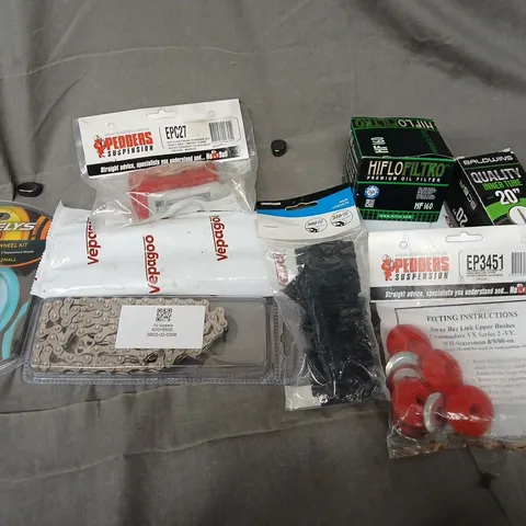 APPROXIMATELY 12 ASSORTED VEHICLE PARTS & ACCESORIES TO INCLUDE OIL FILTER, POLYURETHANE BUSHING KIT, BIKE CHAIN, ETC