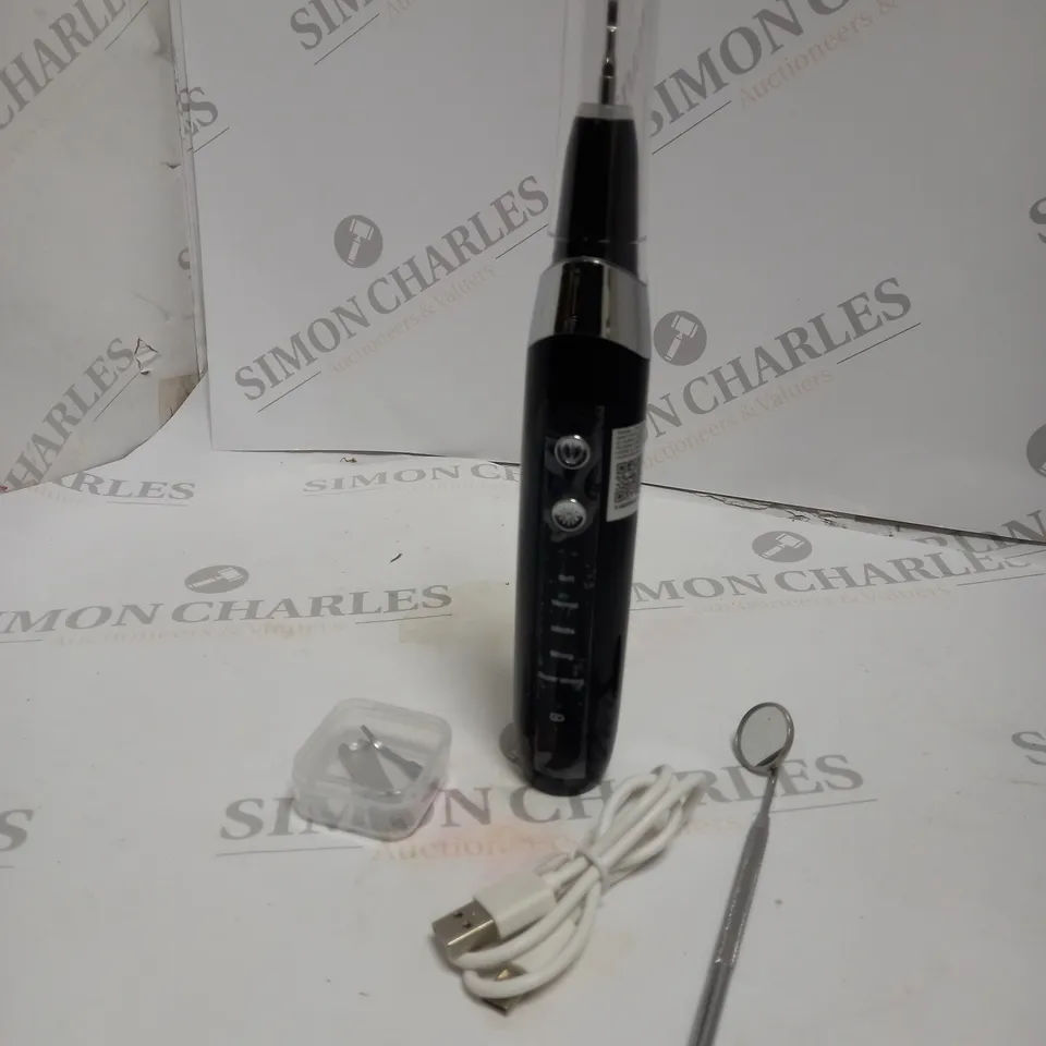 BOXED ULTRASONIC ELECTRONIC INTELLIGENT TOOTH CLEANER.