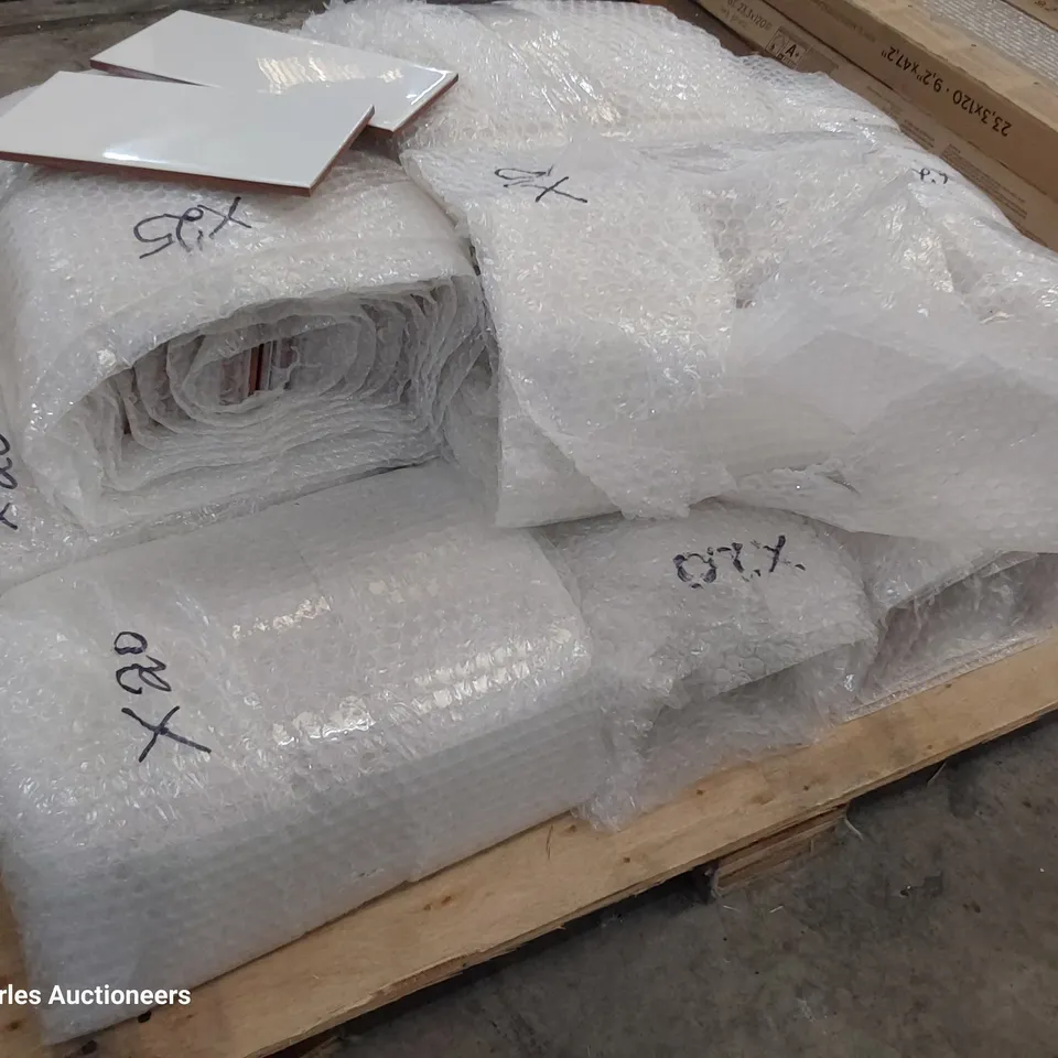 PALLET OF APPROXIMATELY 250 FLAT GLOSS WHITE TILES EACH10 × 20cm TOTAL 5 sq m