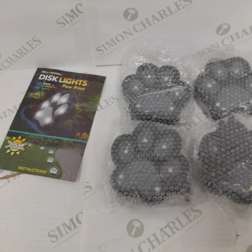 BOXED BELL AND HOWELL SET OF 4 SOLAR PAW LIGHTS