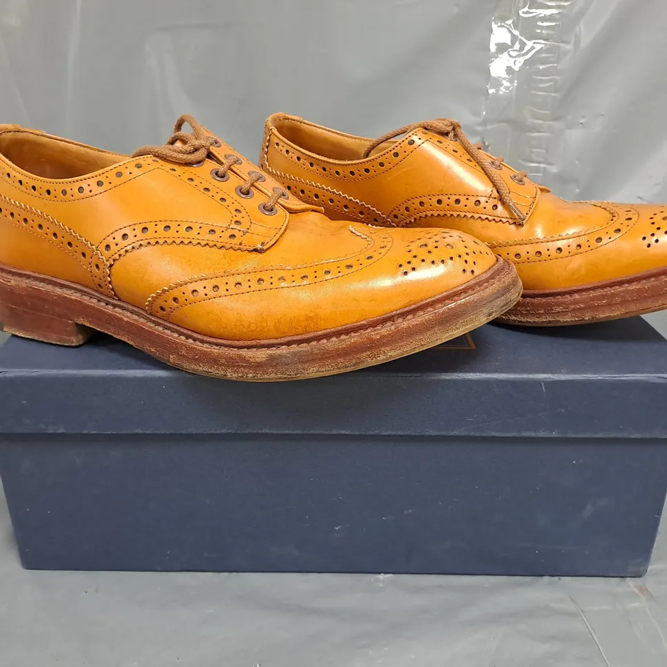 BOXED PAIR OF TRICKER'S LACE UP SHOES IN TAN SIZE 9