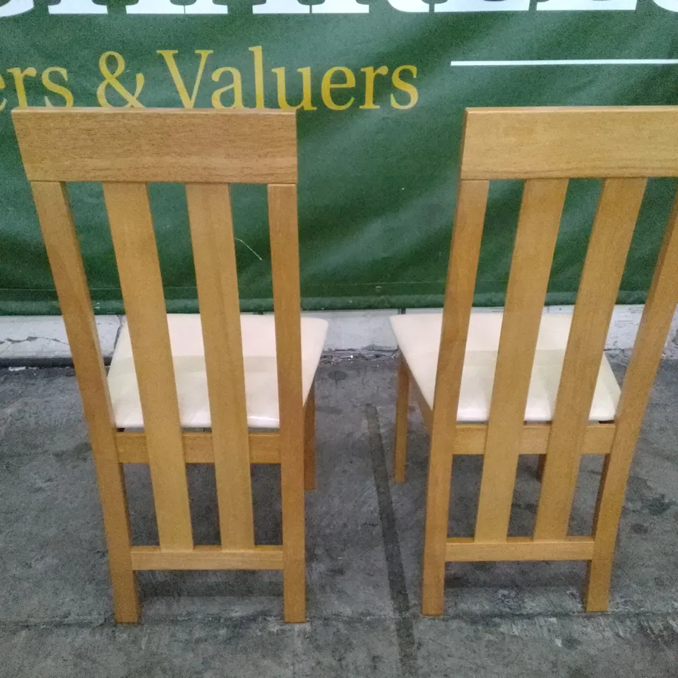 SET OF 2 NEW CHESTER OAK DINING CHAIRS (IVORY LEATHER SEAT PAD)