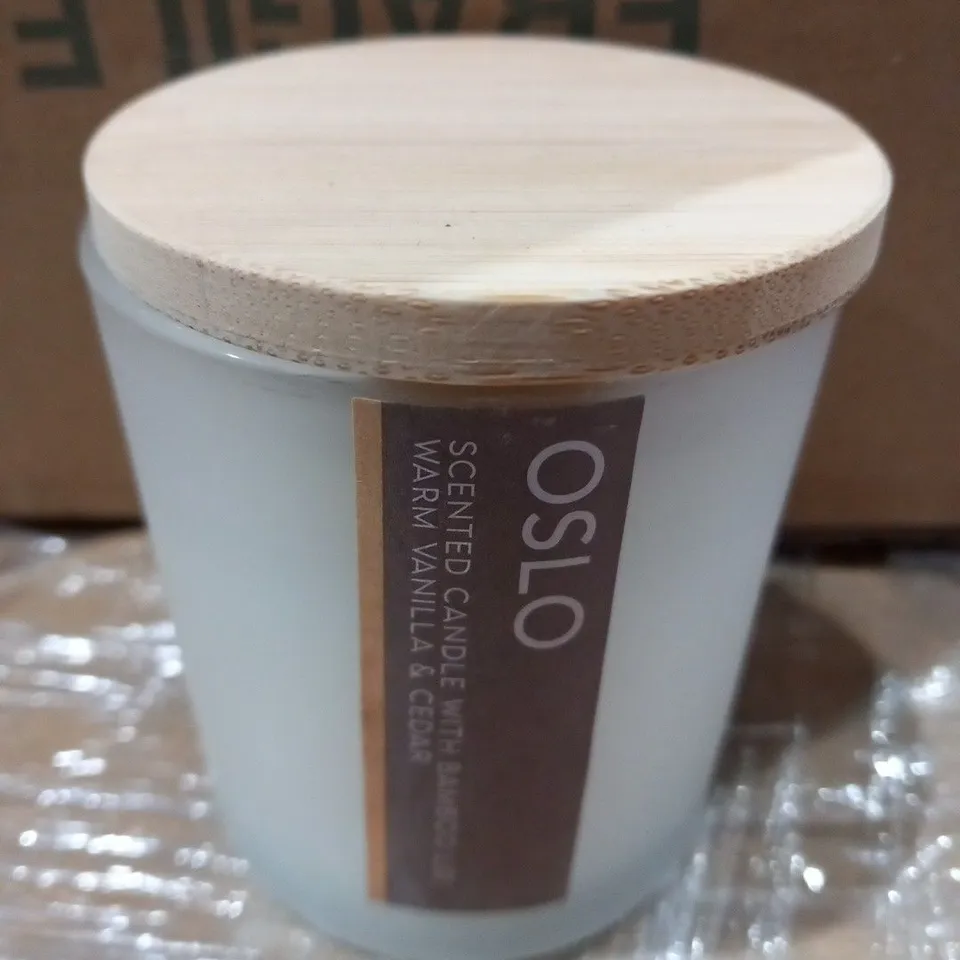 APPROXIMATELY 70 ASSORTED OSLO 120G SCENTED CANDLES TO INCLUDE; WARM VANILA AND CEDAR AND BERGAMOT AND PATCHOULI