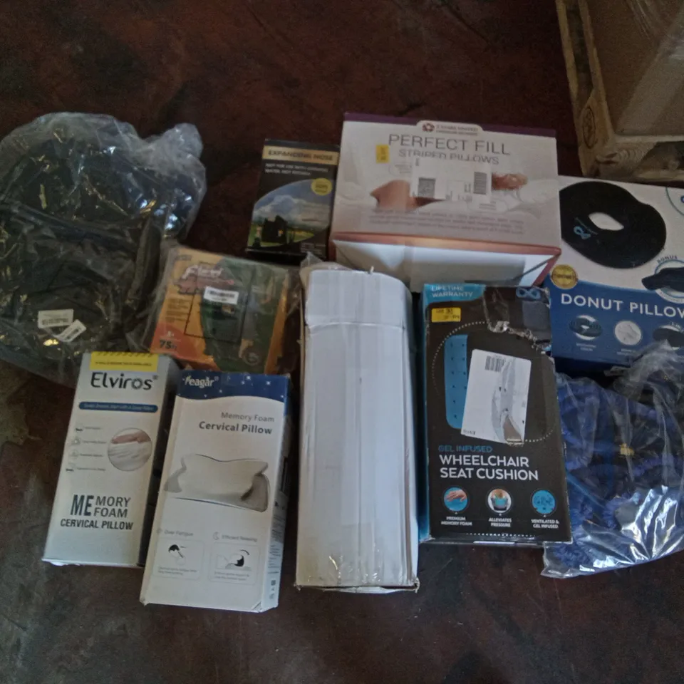 PALLET OF ASSORTED ITEMS INCLUDING INFINITE DONUT PILLOW, PERFECT FILL STRIPPED PILLOW, GEL INFUSED WHEELCHAIR SEAT CUSHION, ELVIROS MEMORY FOAM CERVICAL PILLOW, FEAGAR MEMORY FOAM CERVICAL PILLOW