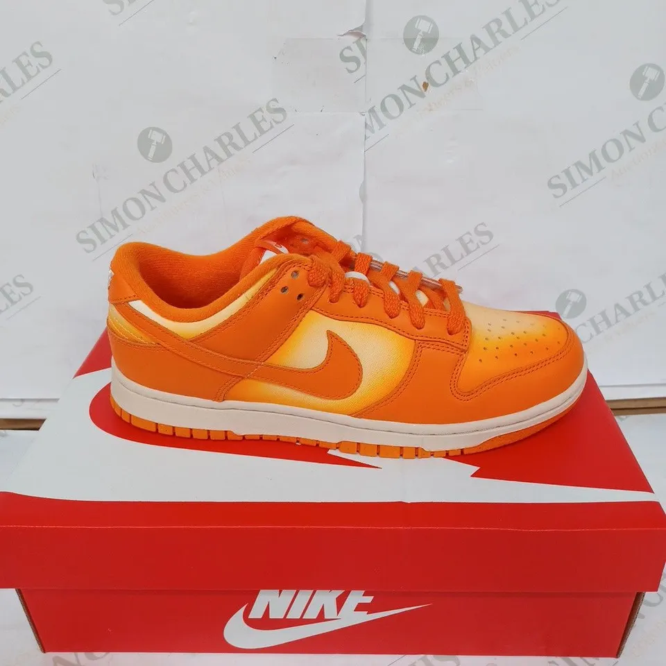 BOXED PAIR OF NIKE WOMEN'S DUNK LOW TRAINERS - WHITE & ORANGE / SIZE: 7 UK 