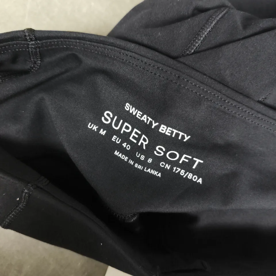 SWEATY BETTY SUER SOFT 7/8 YOGA LEGGINGS IN BLACK - MEDIUM