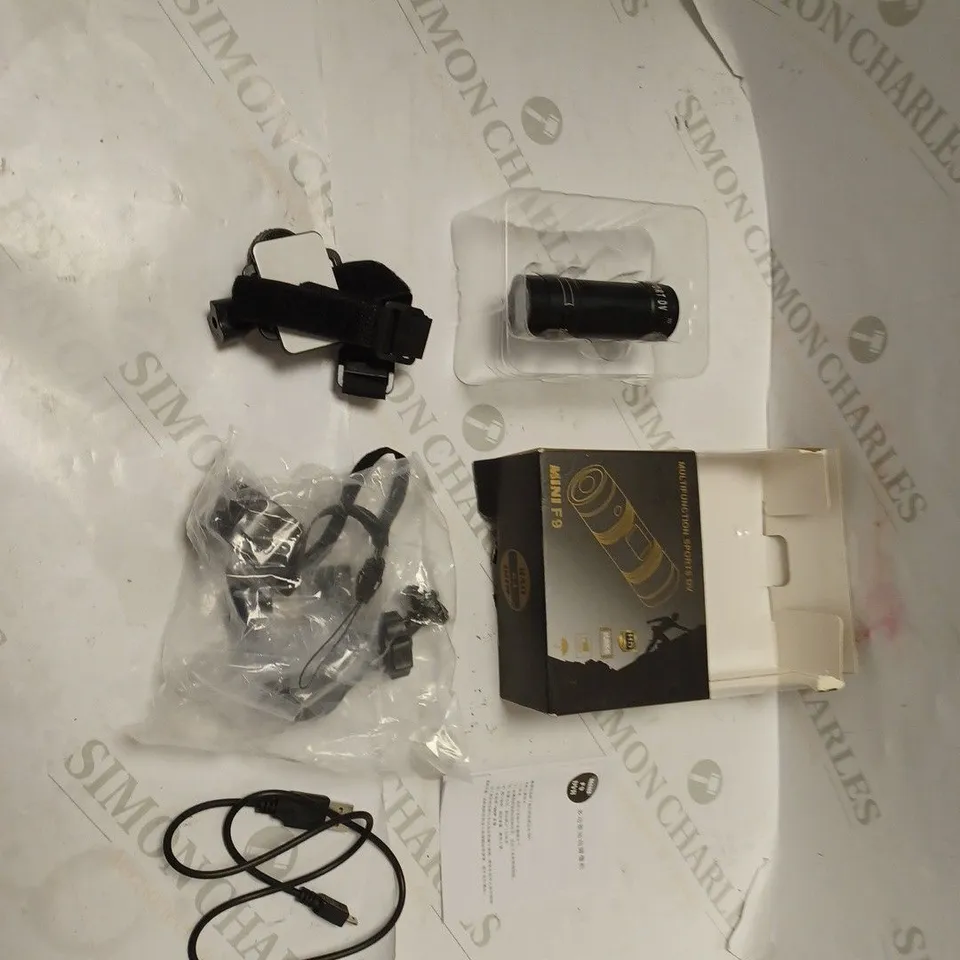 BOXED SPORTS DVR CAMERA WITH WRIST STRAP, ACCESSORIES, USB CABLE AND INSTRUCTIONS