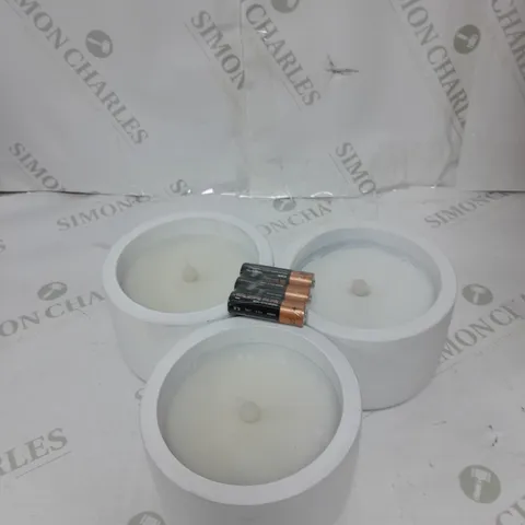 THREE BATTERY OPERATED CANDLES