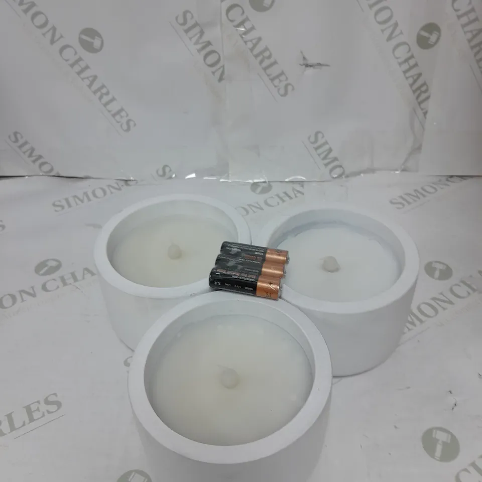 THREE BATTERY OPERATED CANDLES