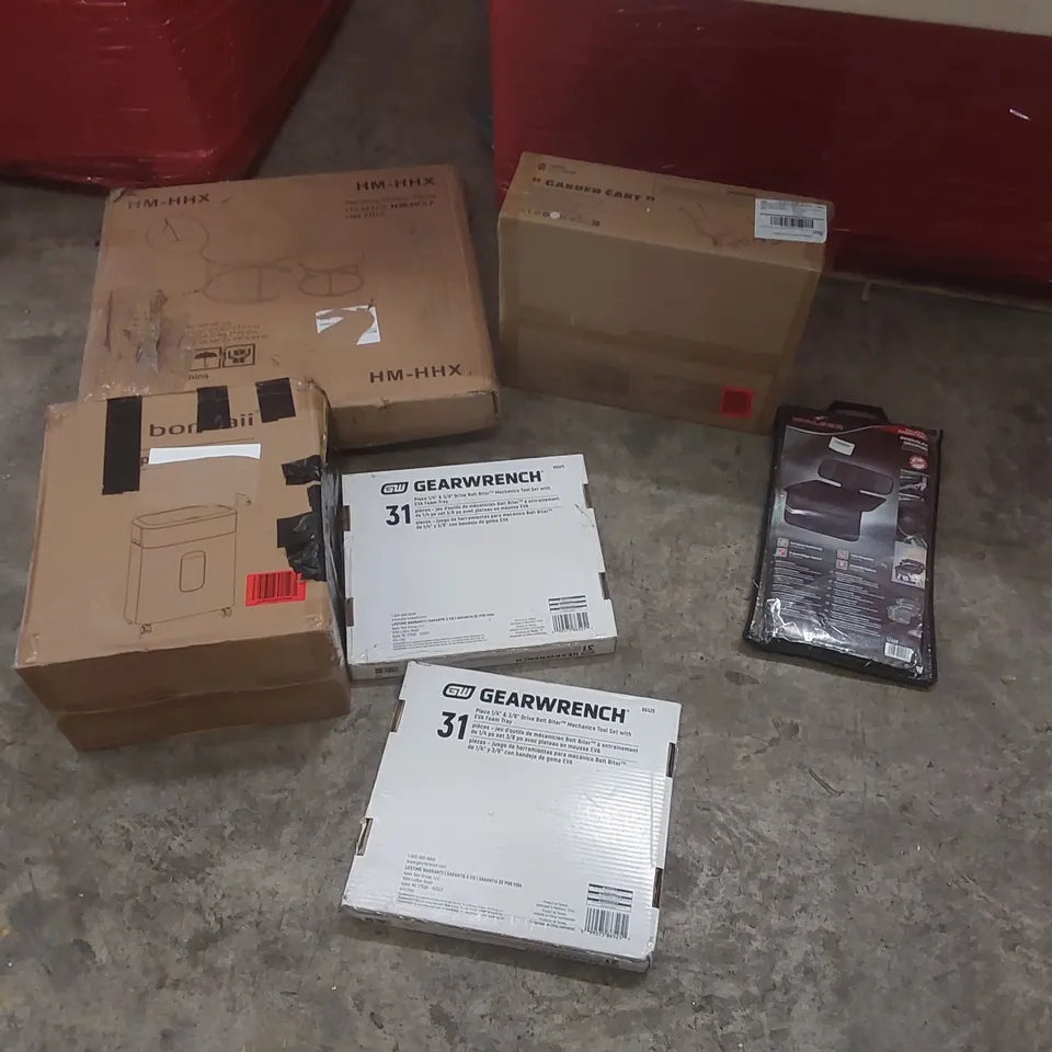 PALLET CONTAINING A LARGE QUANTITY OF ASSORTED ITEMS INCLUDING: MECHANICS TOOL SET, PAPER SHREDDER, CAR SEAT COVER, GARDEN CART, NESTING COFFEE TABLE ECT