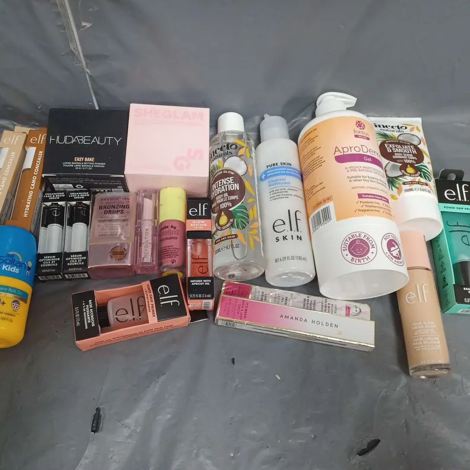 BOX OF APPROXIMATELY 12 ASSORTED COSMETIC ITEMS TO INCLUDE-ELF PRIMER- HUDA BEAUTY POWDER- AMANDA HOLDEN LASH SERUM