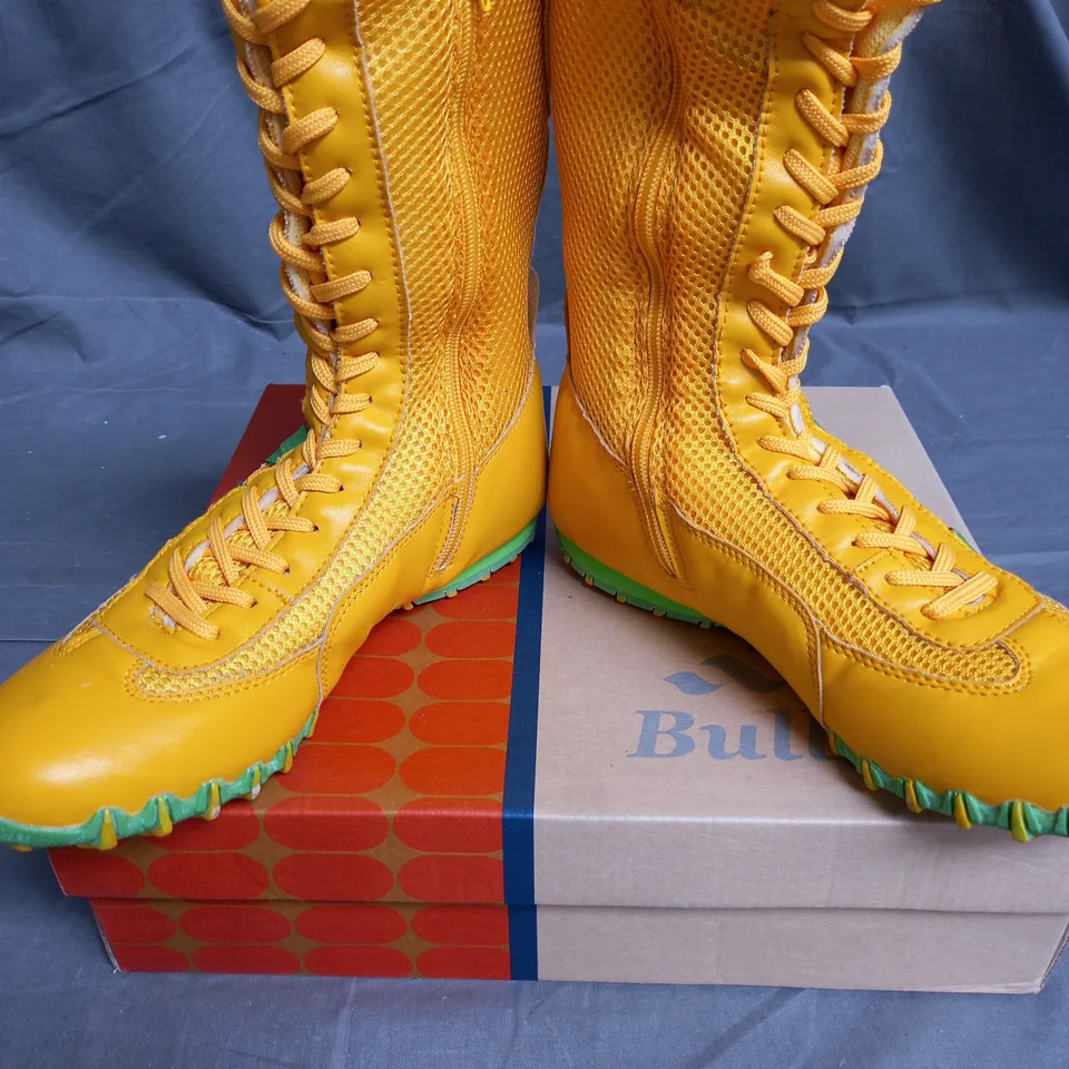 BOX OF 12 PAIRS OF BUILLON BOOTS IN YELLOW/GREEN - VARIOUS SIZES