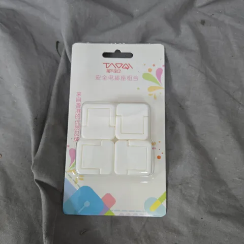 APPROXIMATELY 35 NON UK SAFE SOCKET PROTECTIVE COVERS