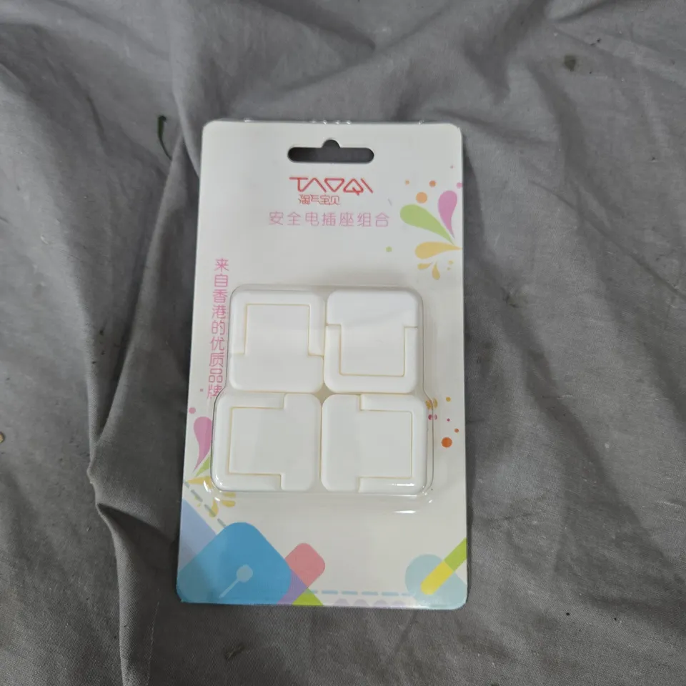 APPROXIMATELY 35 NON UK SAFE SOCKET PROTECTIVE COVERS 