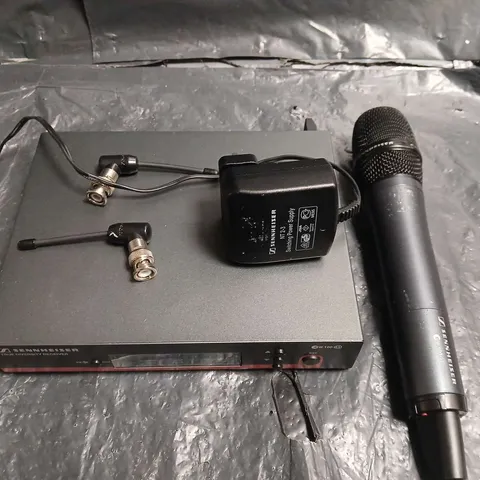 Sennheiser EW 100 wireless microphone system with handheld mic, true diversity receiver, and green Flipo case