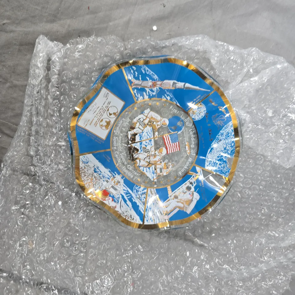 COMMEMORATIVE SPACE-THEMED DECORATIVE PLATE – BLUE ENAMEL, GOLD RIM