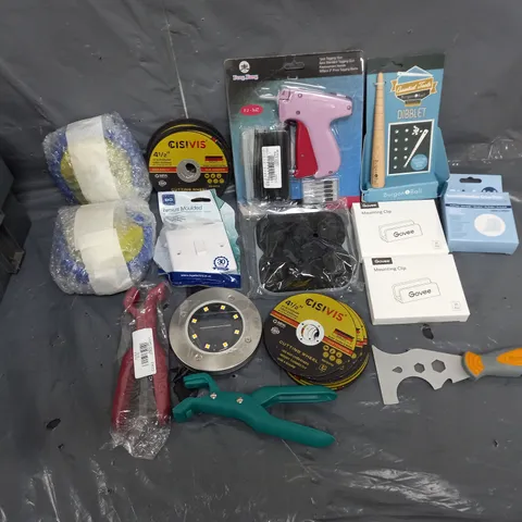 TOTE OF APPROXIMATELY 15 ASSORTED HOUSEHOLD ITEMS TOO INCLUDE GLUE DOTS, TAGGING GUN, AND CISIVIS CUTTING WHEEL ETC.