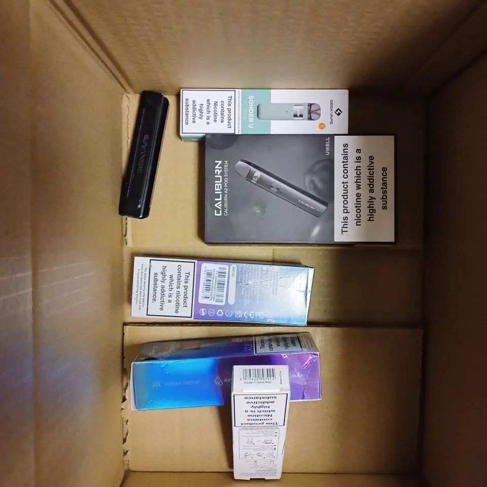 BOX OF APPROX 10 ITEMS TO INCLUDE CALIBURN A2, VOOPOO DORIC Q, OXVA XLIM SE.