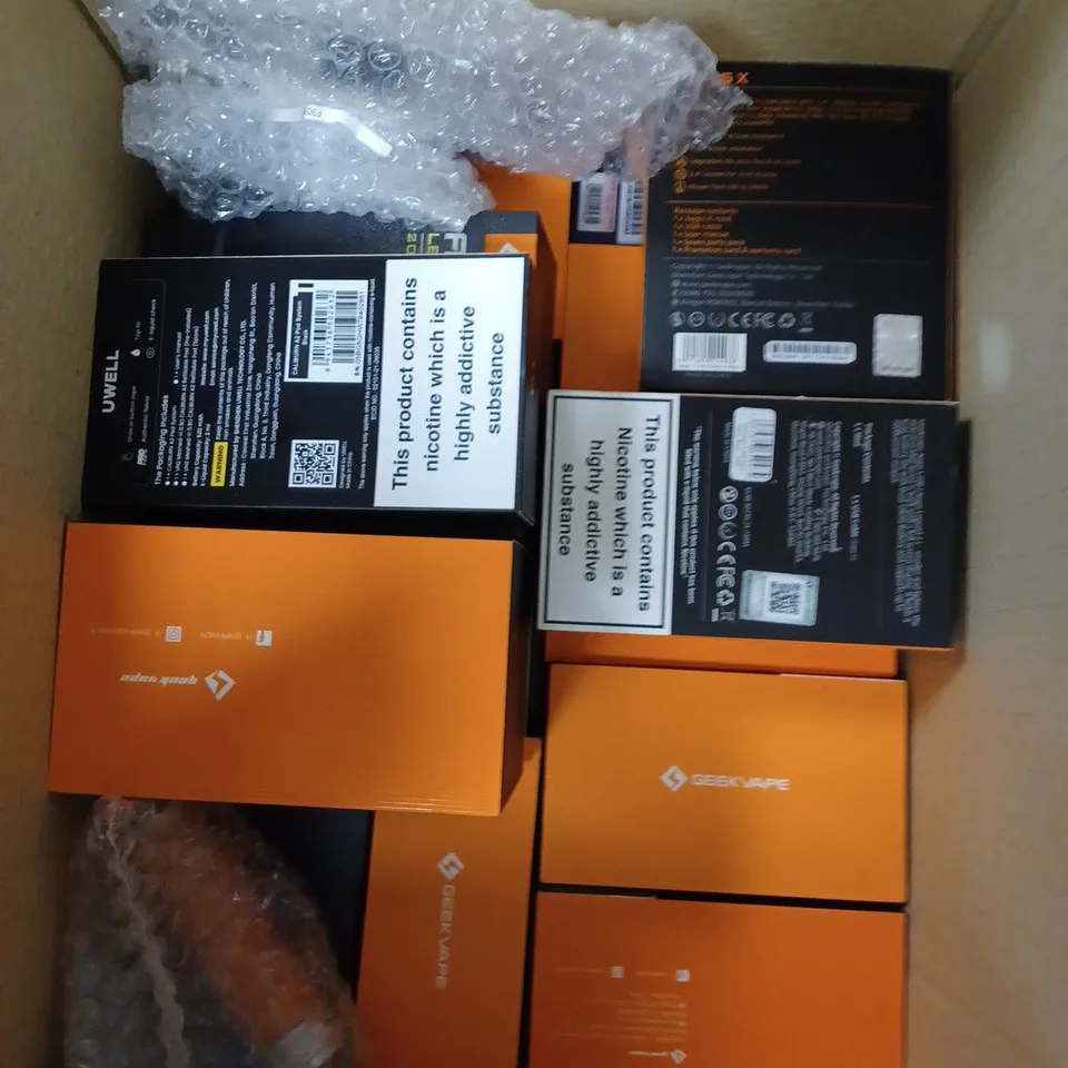 BOX OF APPROXIMATELY 30 E-CIGARETTE PRODUCTS TO INCLUDE GEEKVAPE AEGIS X, CALIBURN A2, URSA NANO PRO ETC