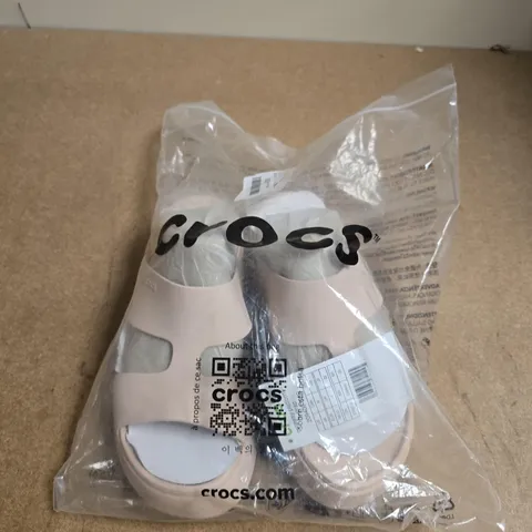 PAIR OF CROCS WOMEN'S PINK SLIDES β UK SIZE 4