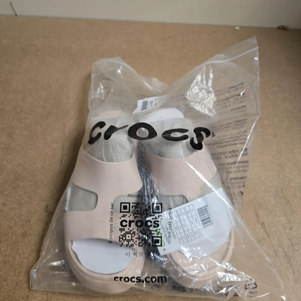 PAIR OF CROCS WOMEN'S PINK SLIDES – UK SIZE 4
