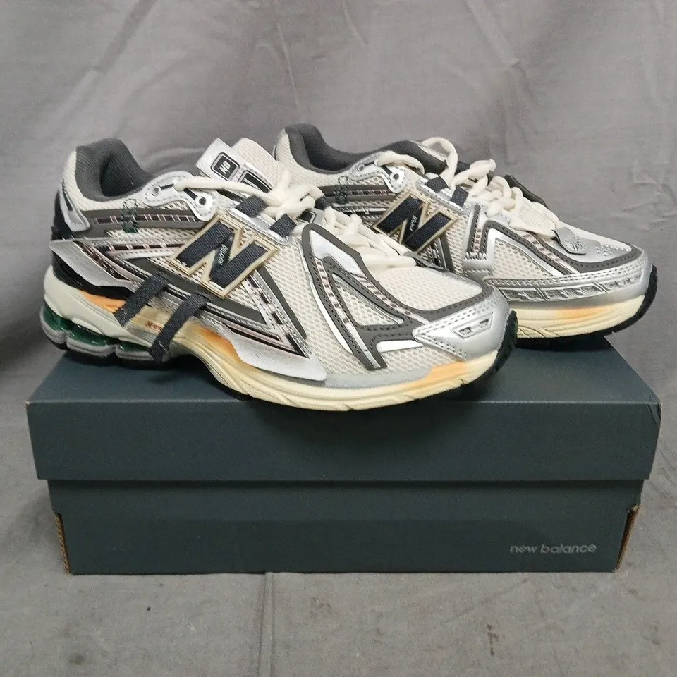 BOXED PAIR OF NEW BALANCE 1906A TRAINERS IN OFF WHITE/SILVER/BLACK SIZE UK 6