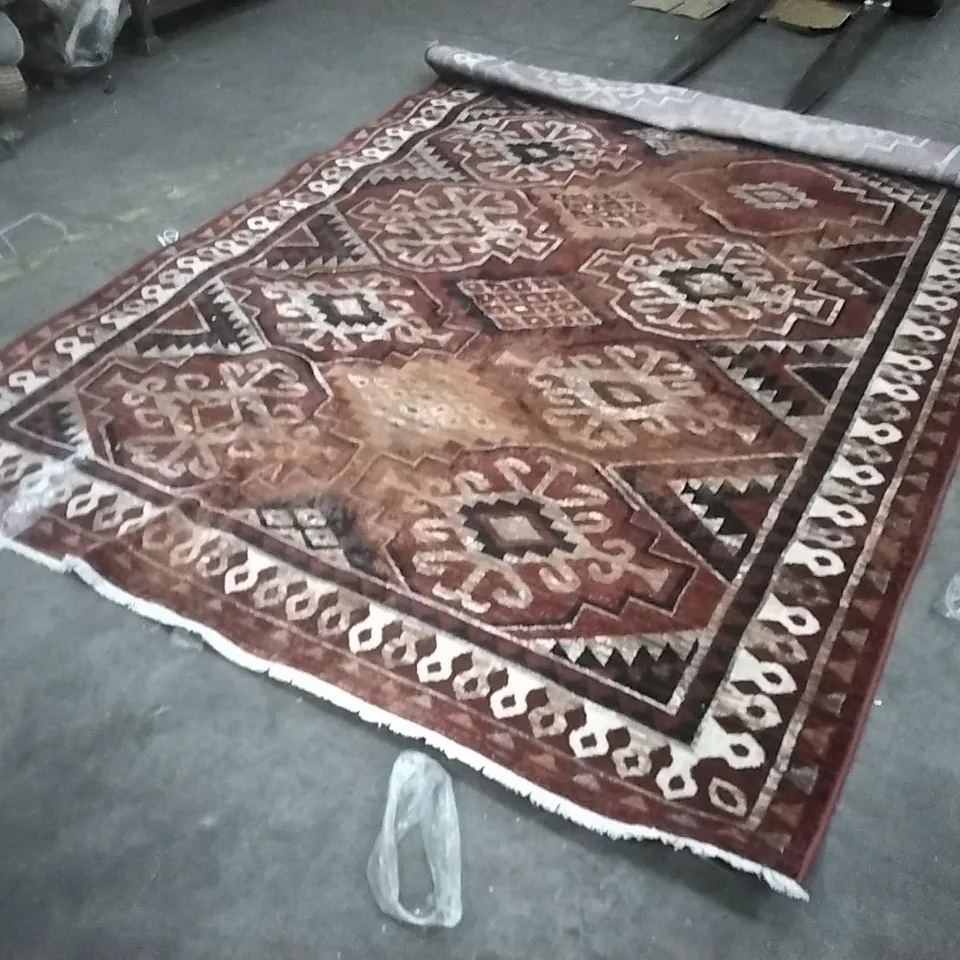 STILLAGE OF APPROXIMATELY 22 DESIGNER RUGS