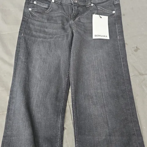 BERSHKA BOOTCUT JEANS IN BLACK SIZE UK 8 (EU 36)