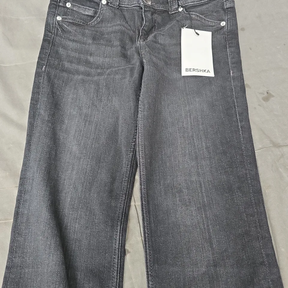 BERSHKA BOOTCUT JEANS IN BLACK SIZE UK 8 (EU 36)