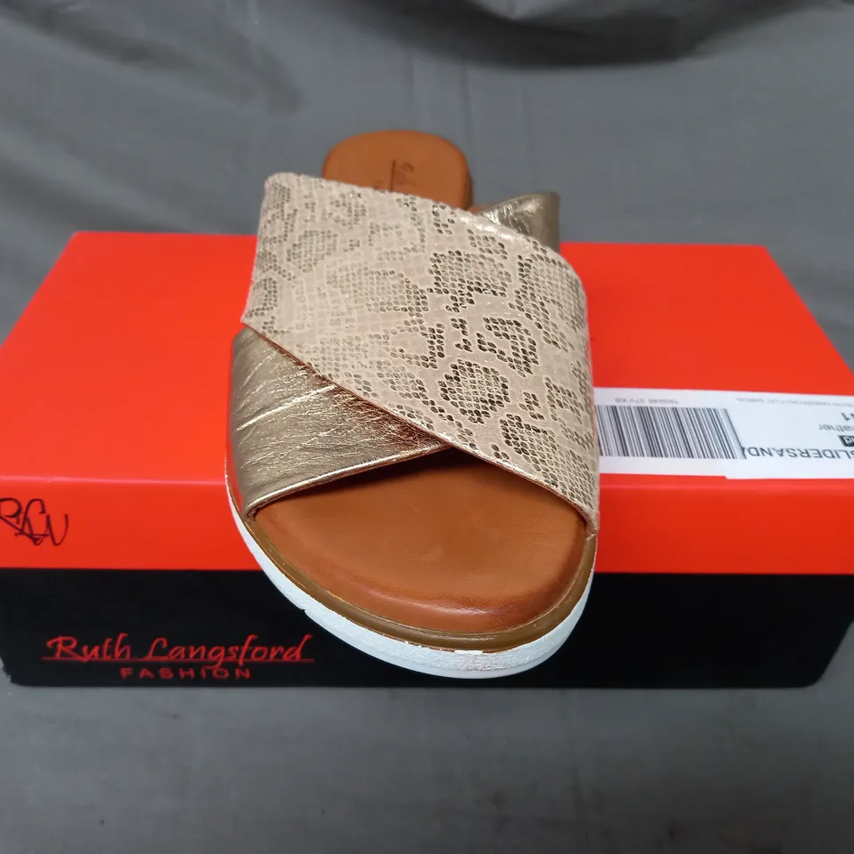 BOXED PAIR OF RUTH LANGSFORD FLAT SANDALS IN METALLIC CHAMPAGNE GOLD SIZE 8