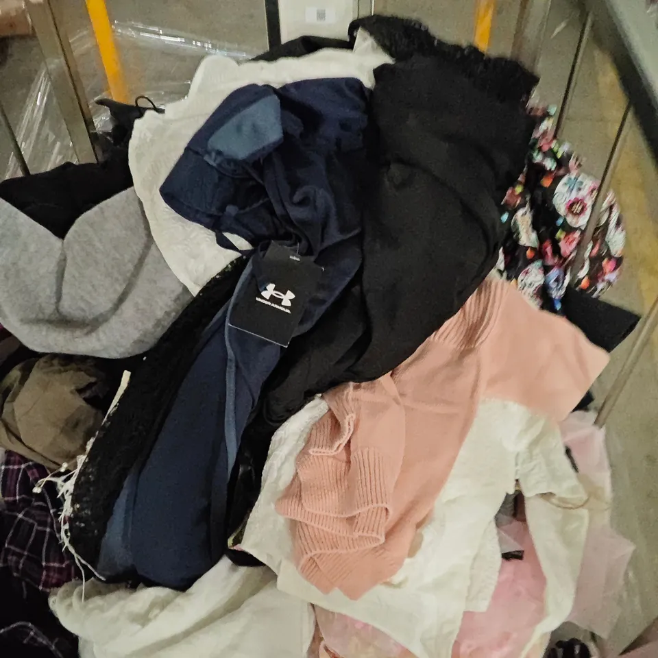 CAGE OF ASSORTED CLOTHING ITEMS TO INCLUDE MERRELL, RIHOAS AND UNDER ARMOUR
