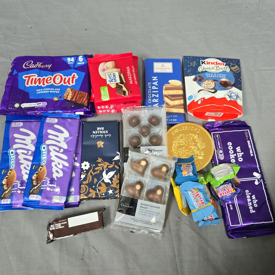 LOT OF ASSORTED CHOCOLATE ITEMS TO INCLUDE CADBURYDS, MILKA AND HOTEL CHOCLAT