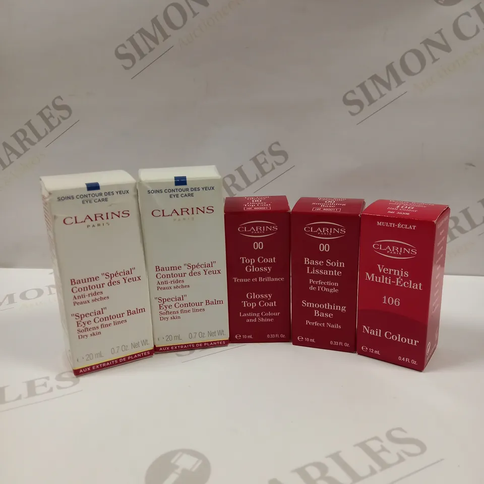 LOT OF APPROX 5 CLARIN PARIS SKIN CARE AND NAIL PRODUCTS TO INCLUDE SPECIAL EYE CONTOUR BALM, GLOSSY TOP COAT, SMOOTHING BASE