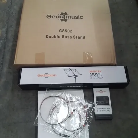 BOXED GEAR4MUSIC MUSIC EQUIPMENT TO INCLUDE; CHROMATIC TUNER & METRONOME, MUSIC STAND, DOUBLE BASS STAND ETC