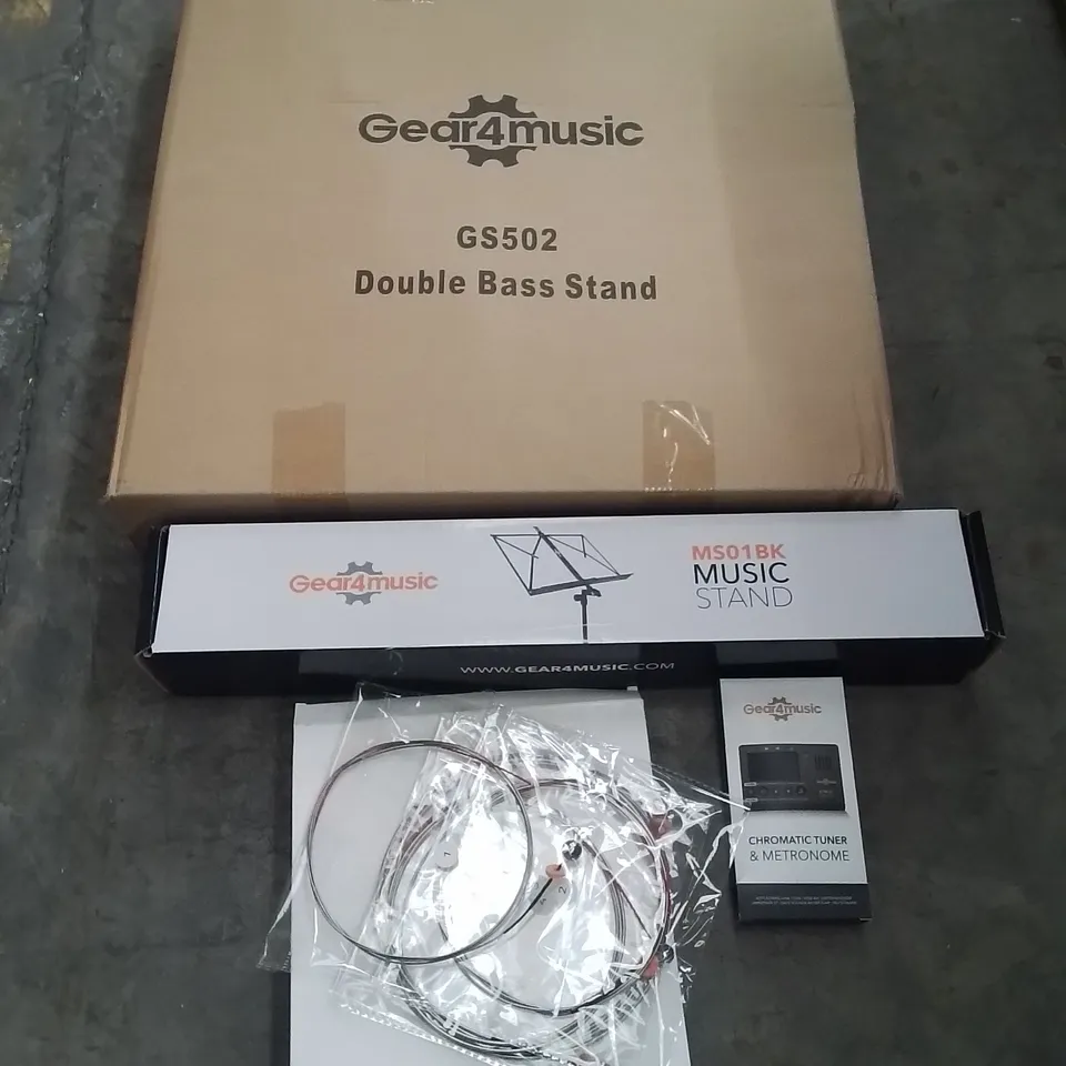 BOXED GEAR4MUSIC MUSIC EQUIPMENT TO INCLUDE; CHROMATIC TUNER & METRONOME, MUSIC STAND, DOUBLE BASS STAND ETC 