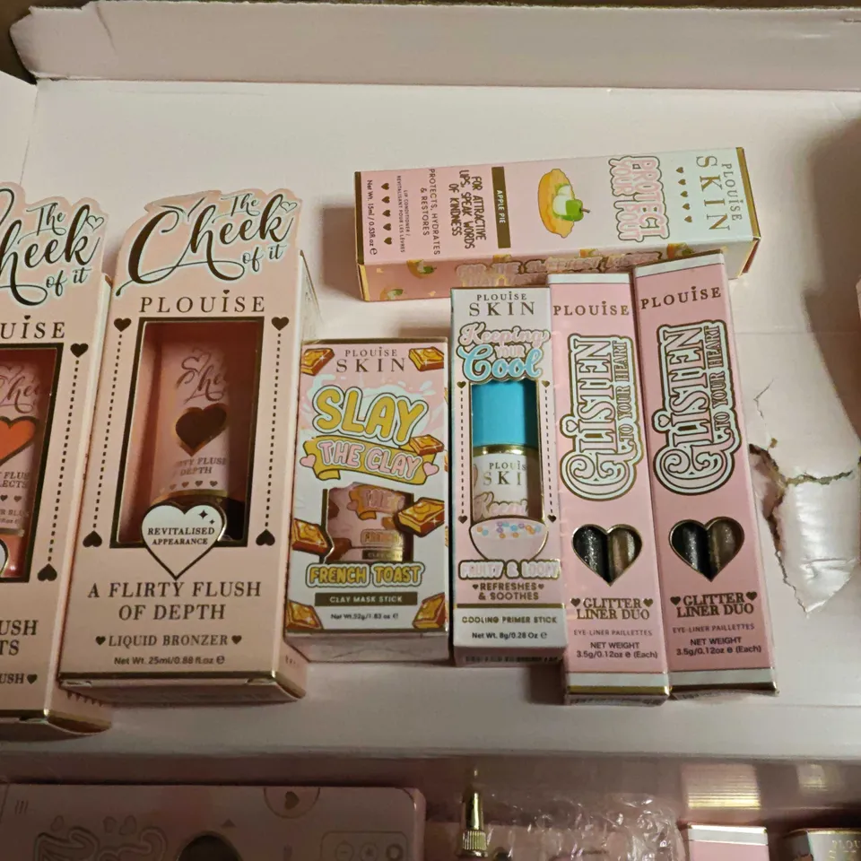 LOT OF APPROXIMATELY 19 ASSORTED PLOUISE COSMETIC ITEMS TO INCLUDE LIQUID BRONZER, BODY SCRUB AND LINER DUO