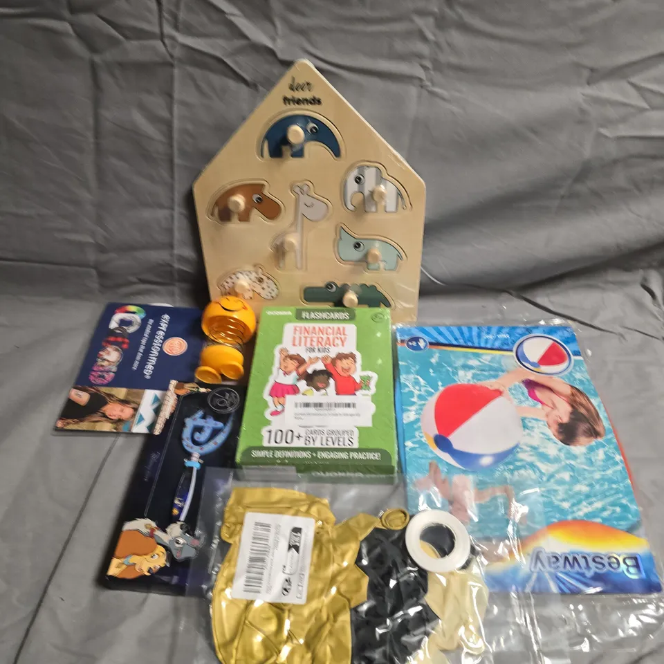 TOTE OF ASSORTED TOYS AND GAMES TO INCLUDE CARD GAMES, JIGSAWS AND BLOW UP BALL 