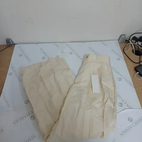 ARNE FLARED CREAM TROUSERS EUR 36