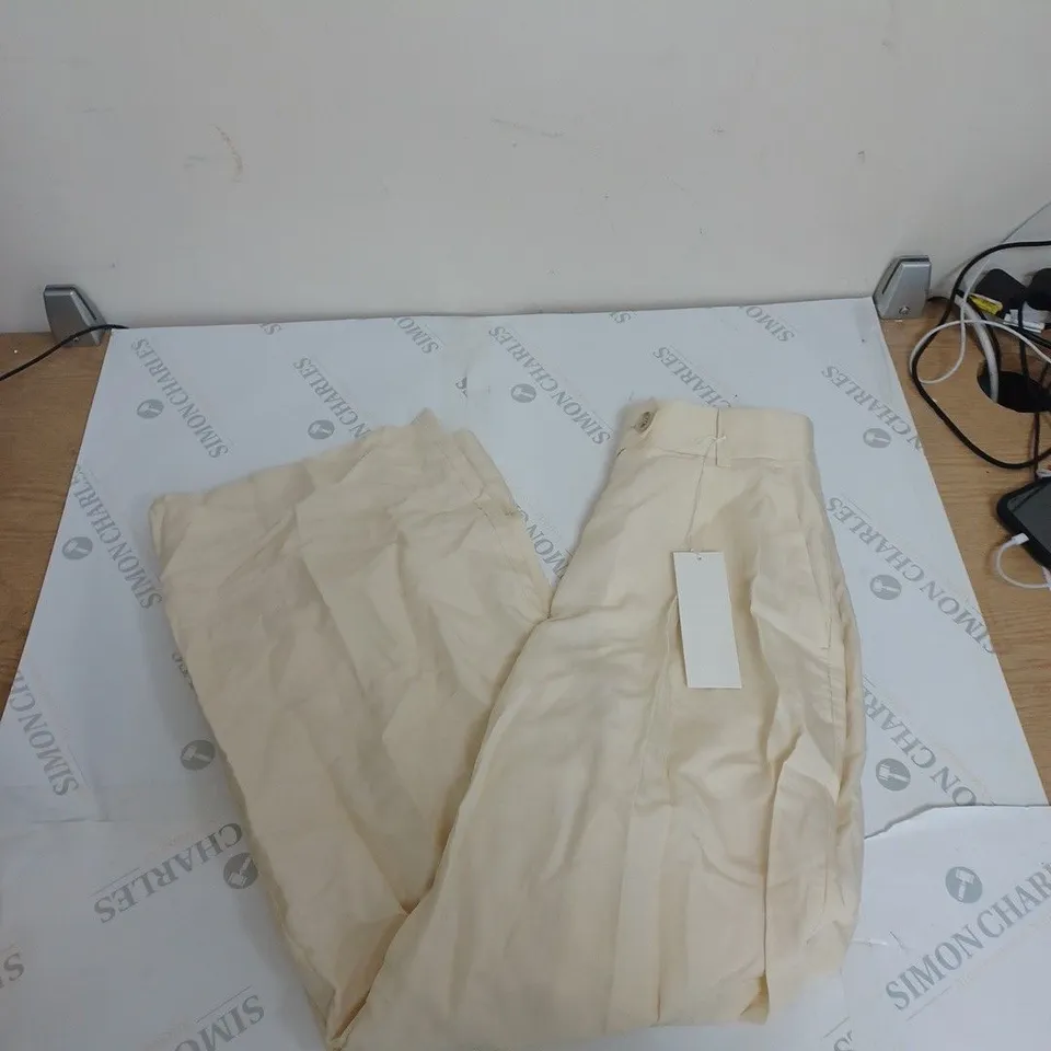 ARNE FLARED CREAM TROUSERS EUR 36 