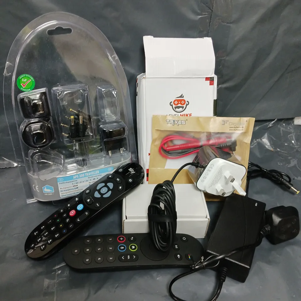 APPROXIMATELY 10 ASSORTED HOUSEHOLD ITEMS TO INCLUDE POWER CABLES, APS 300 TRAVELLER, SKY REMOTES, ETC