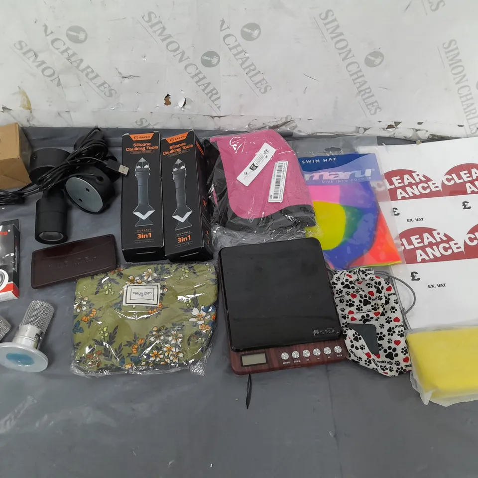 TOTE OF APPROX 10 HOUSEHOLD ITEMS TOO INCLUDE CLEARANCE STICKERS, SILICONE CAULKING TOOLS, AND FOOD SCALES ETC. 